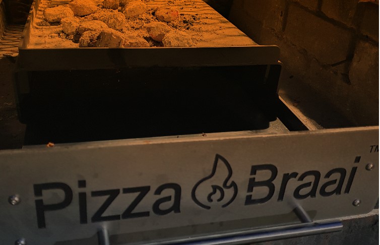 #1 in Braai Area Ideas |The ultimate braai accessory – The Pizza Braai™